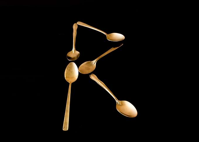 Letter R made of spoons