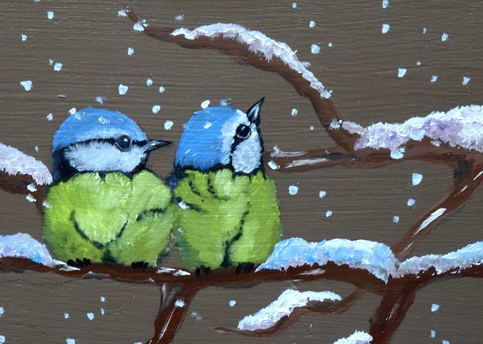 Two little Chickadees