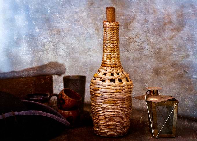 Wine Flask And A Lantern