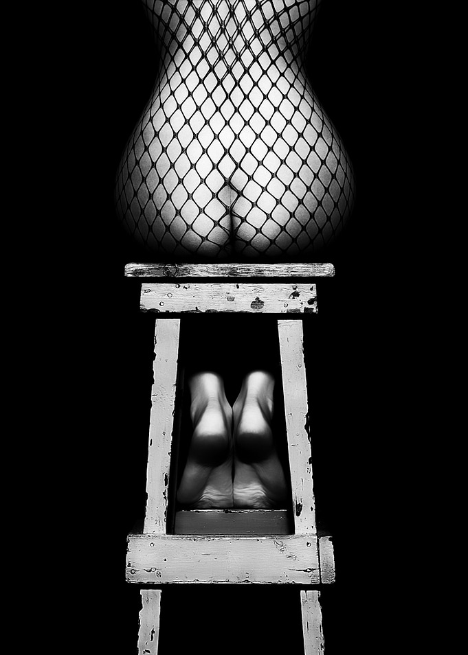 Sensual woman sitting rear