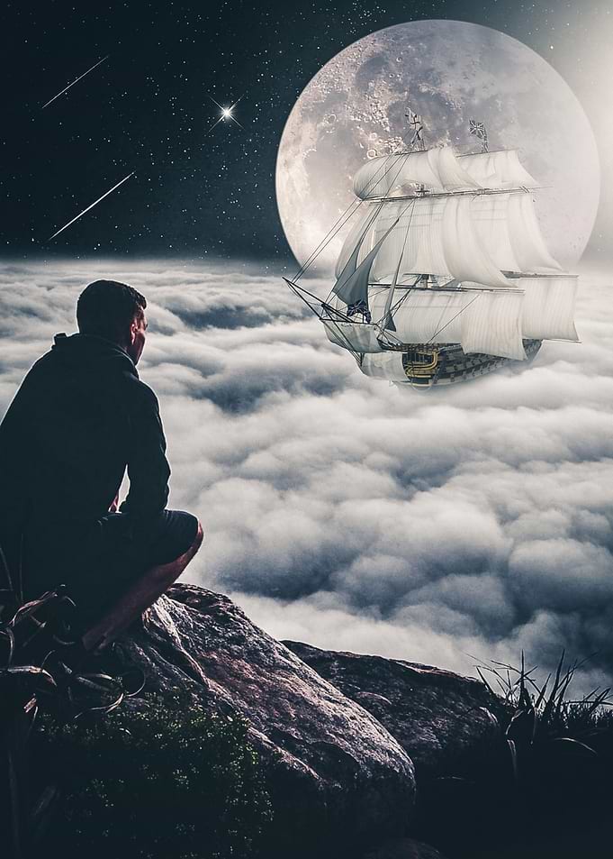 Boat sails on sea clouds