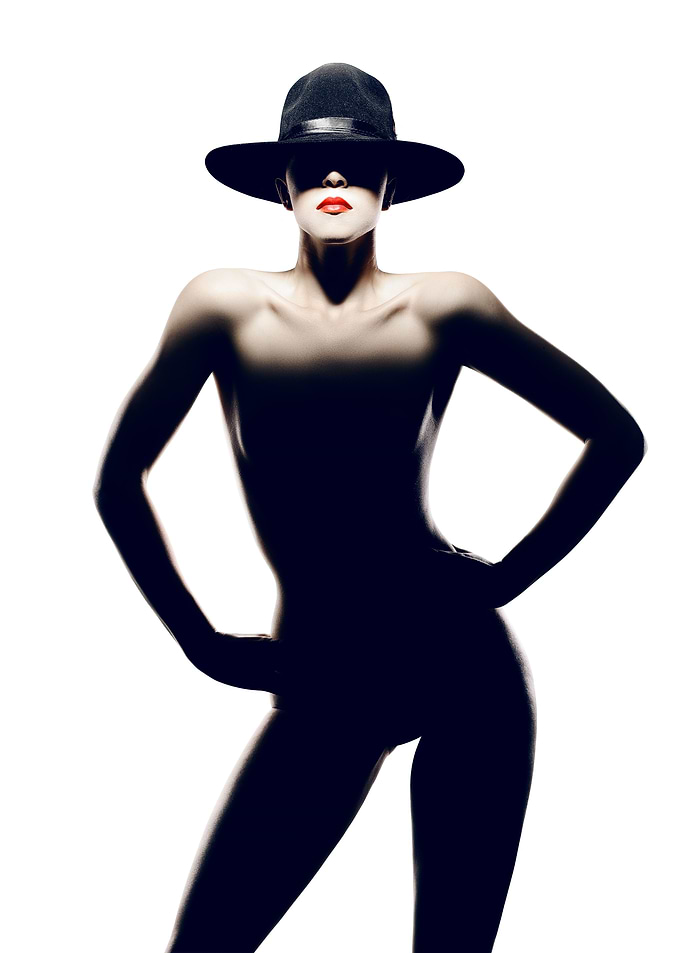 Nude woman with hat