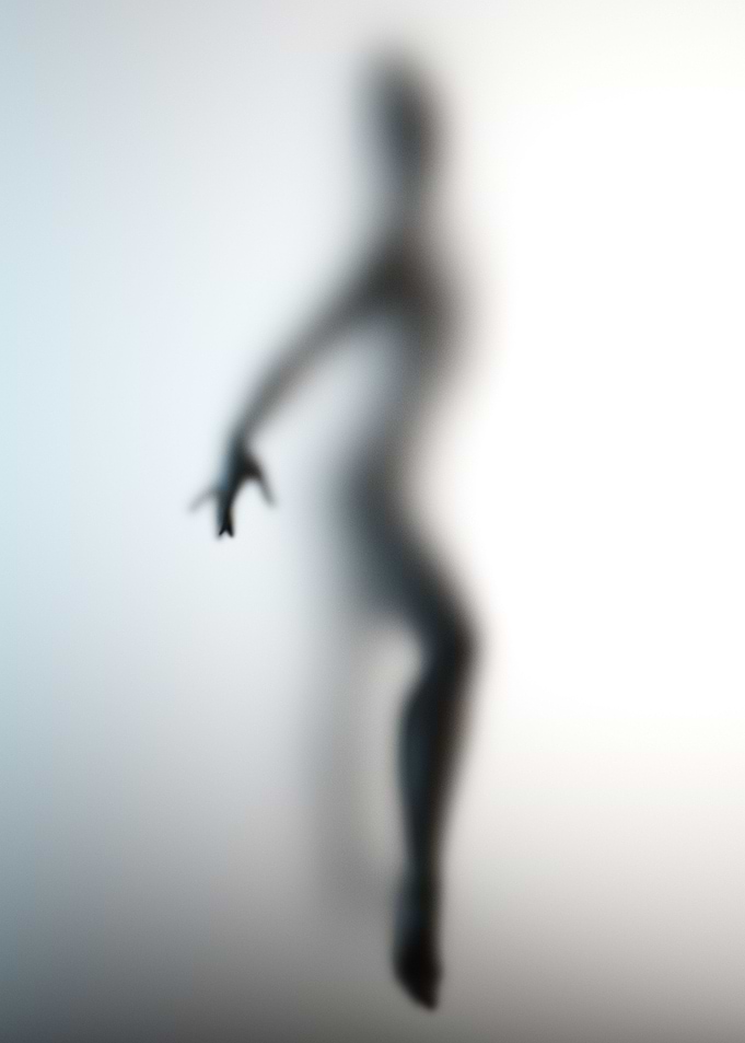 Behind the frosted glass