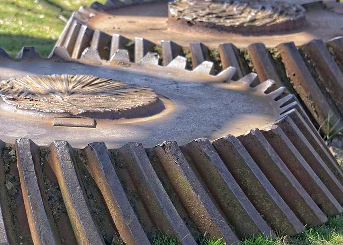 Rusty gears on the ground