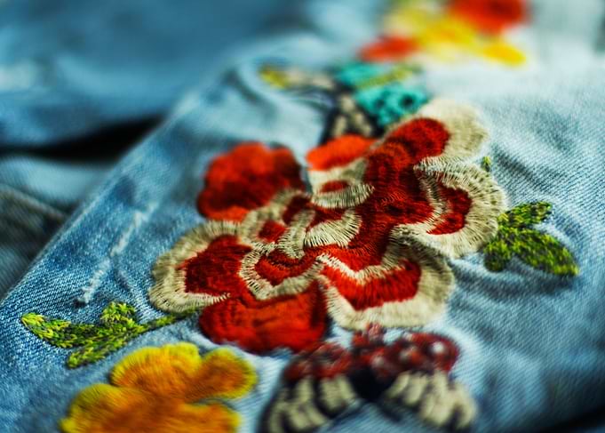 Embroidery flower on jeans
