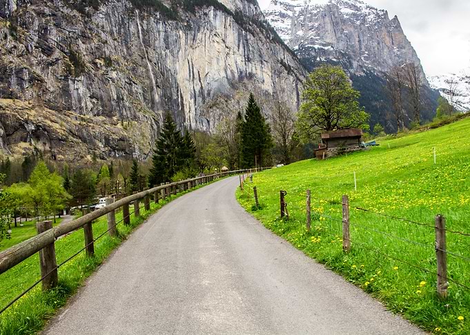 Road curve to the Alps
