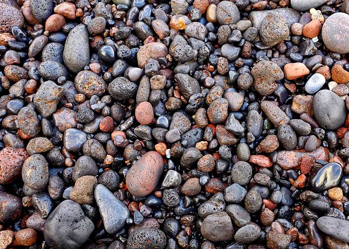 Wet volcanic pebbles