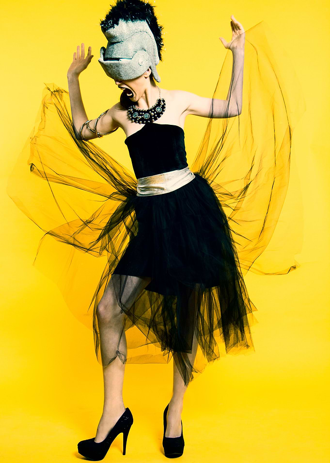Clubbing woman on yellow
