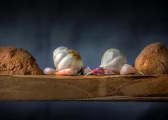 Garlic cloves and bread