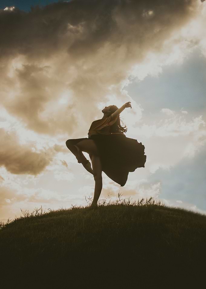 Girl dancing in dusk