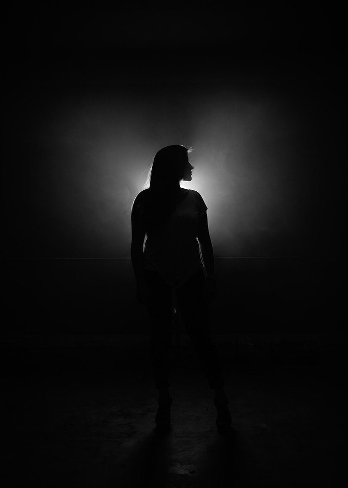 Woman silhouette in light