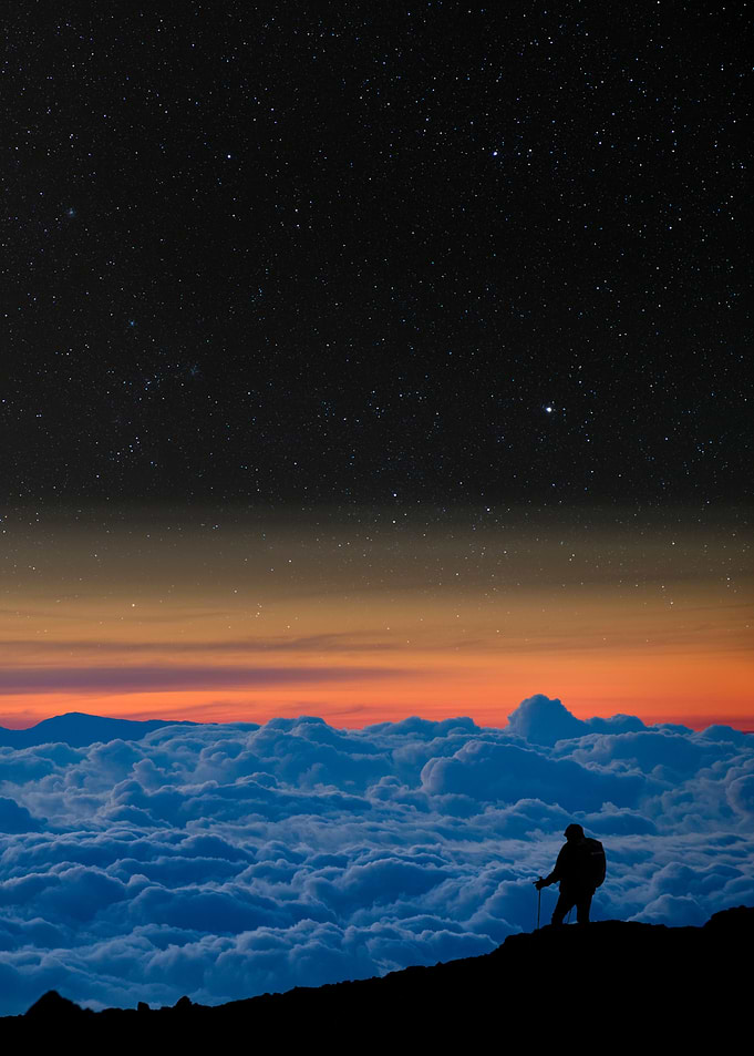 Climber above the clouds