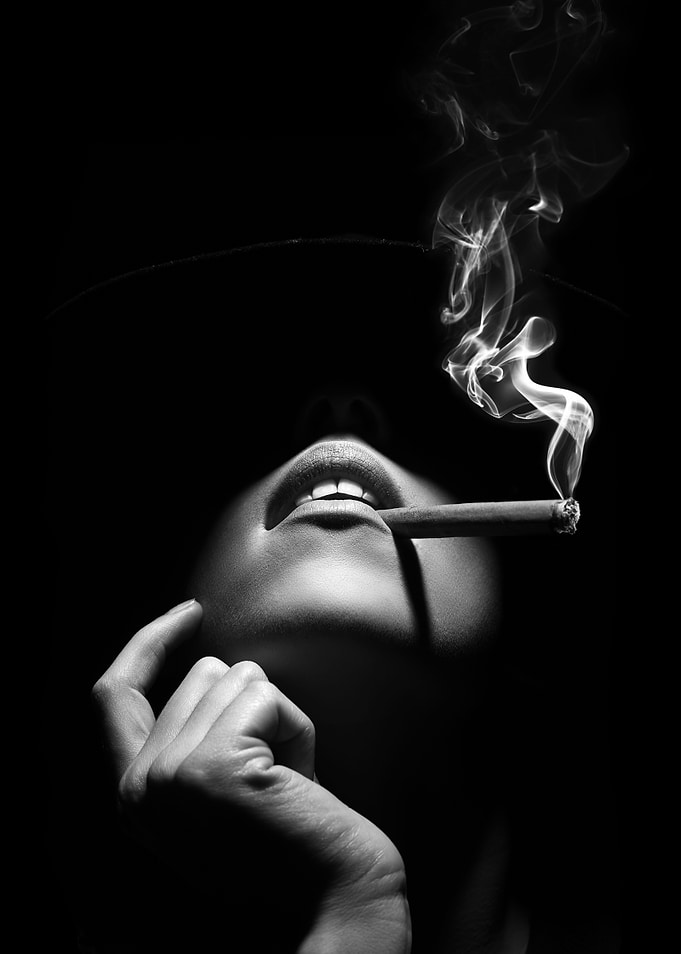 Woman smoking a cigar