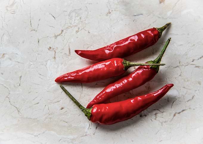 Chillies on marble plate