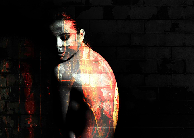 Naked woman in the dark