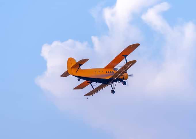 Plane flying on the sky