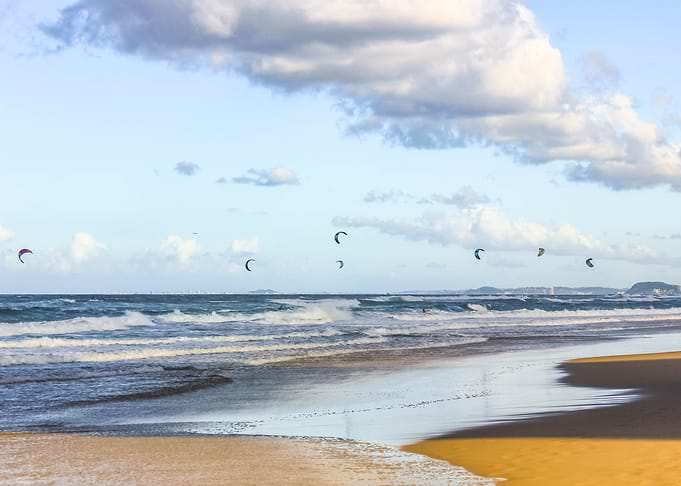 beach and fluffy clouds