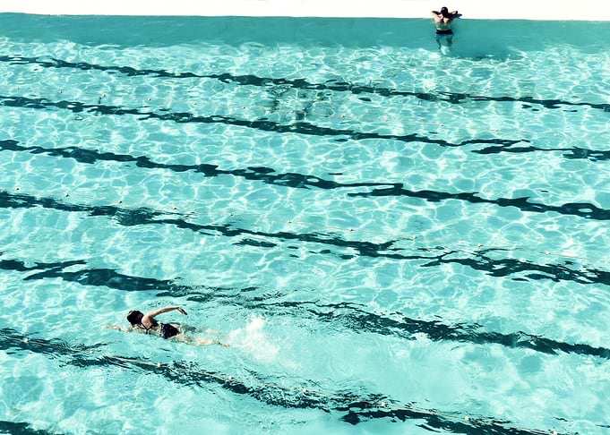 Swimmers and the pool