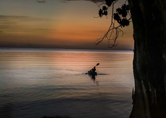 Rowing at sunset
