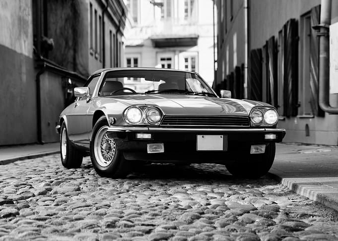 Old car in old town