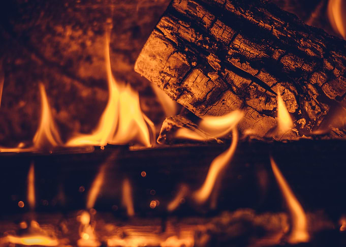 Flames in cozy fireplace