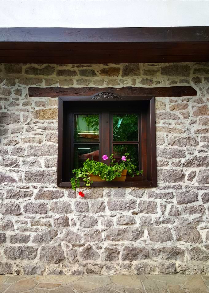 A wooden window on a wall