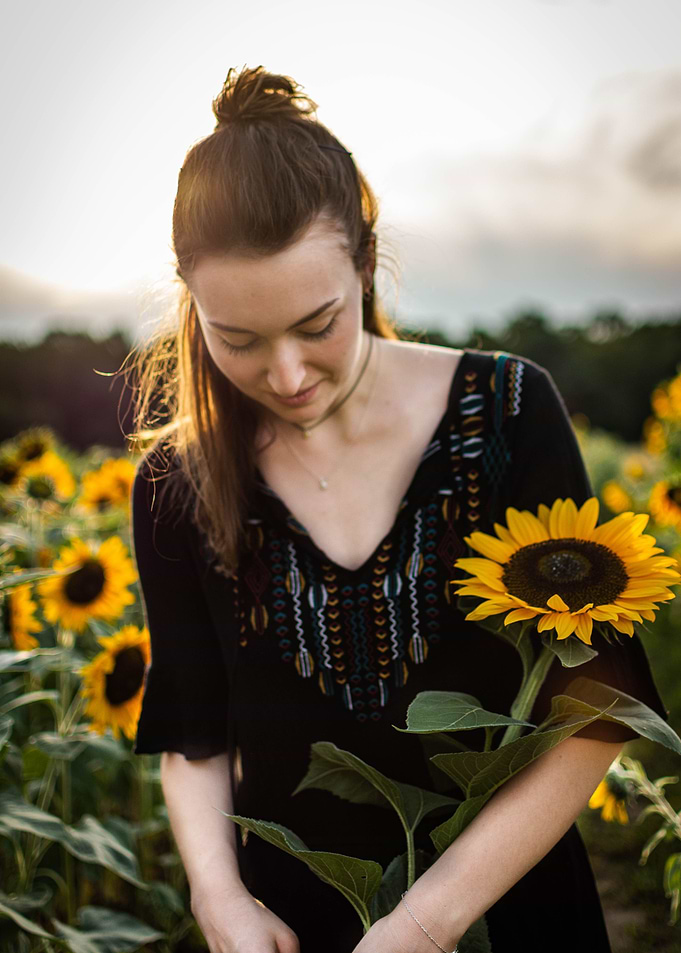 Girl in a sunflowerfield