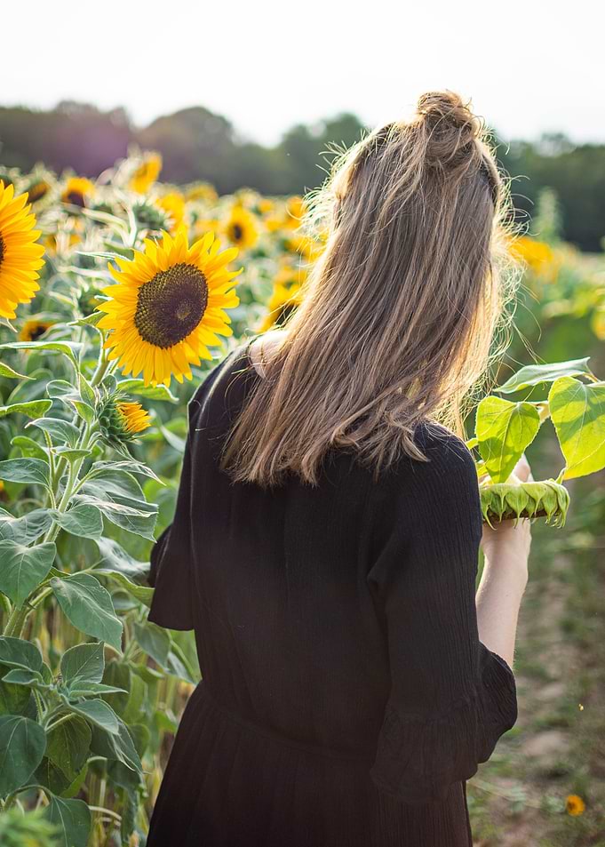 Girl in a sunflowerfield