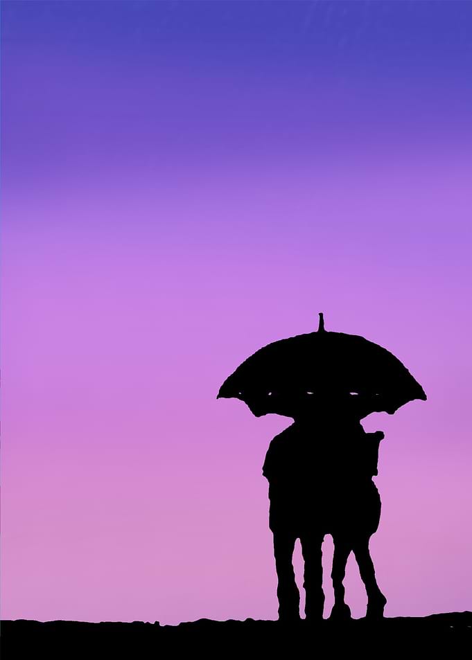 sharing an umbrella