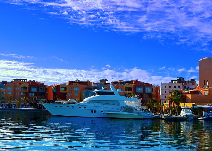white yacht in marina