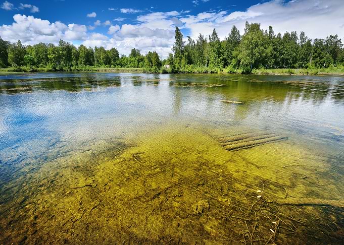 A Quarry Lake In Latvia Wi