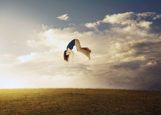 Woman Floating To Sky