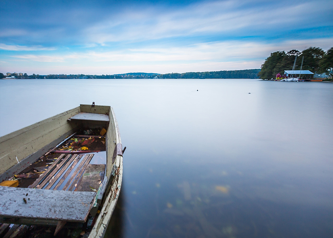 Lake Shore With Moored Boa