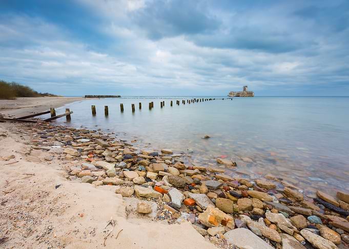 Beach With Old Military Bu