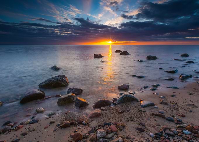 Rocky Sea Shore At Sunrise