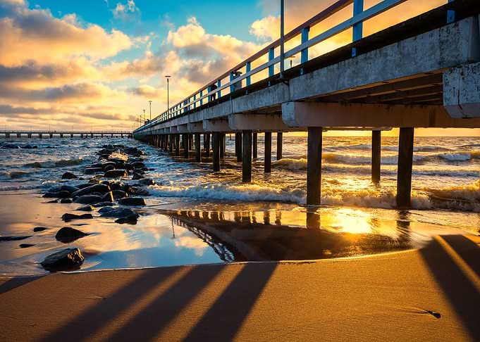 Pier And Sea At Sunset