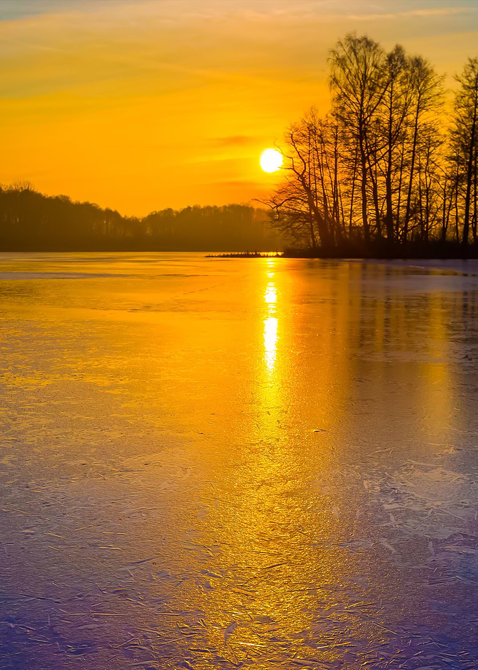 Frozen Lake At Sunrise Or
