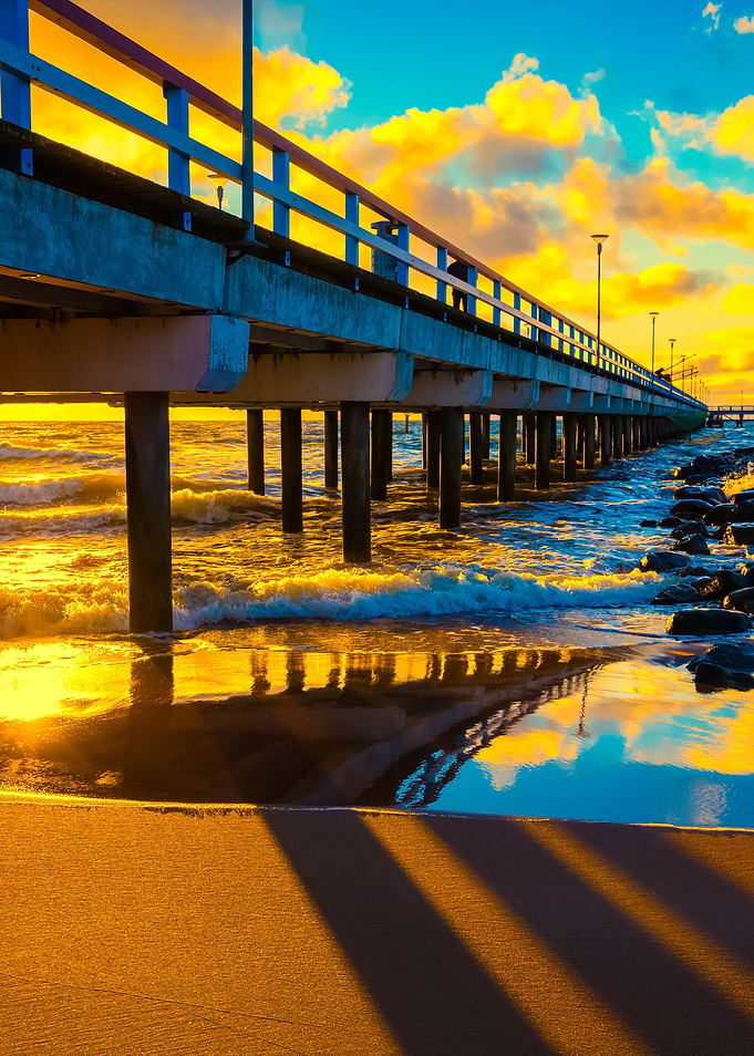 Pier And Sea At Sunset