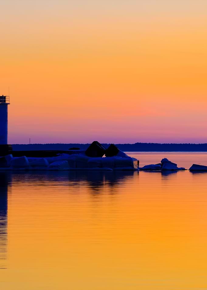 Lighthouse In The Sea At T
