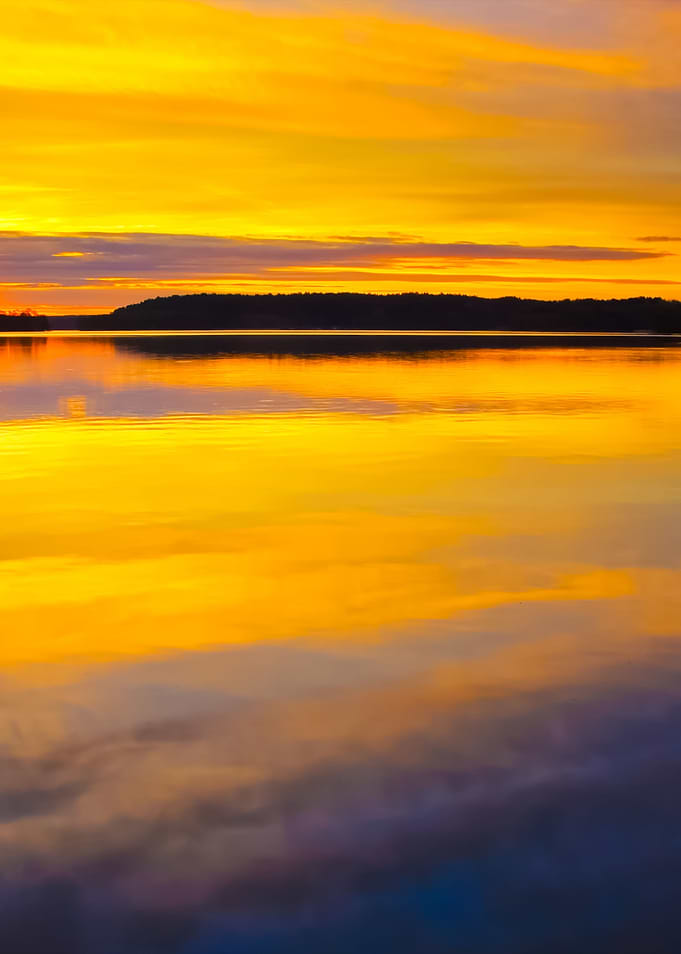 Lake With Reflected Sky In