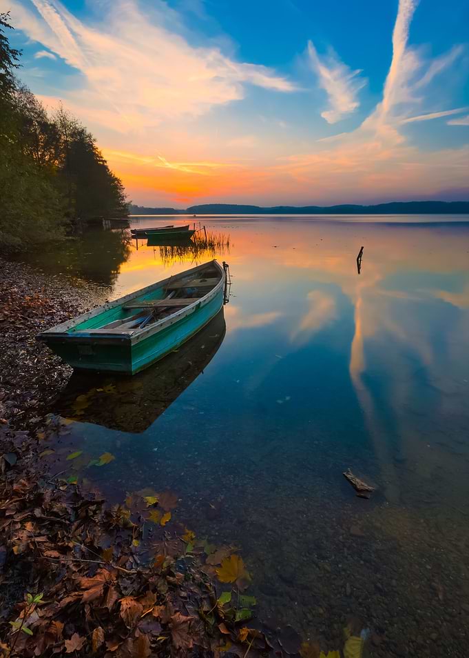 Sunset Lake With Fisherman