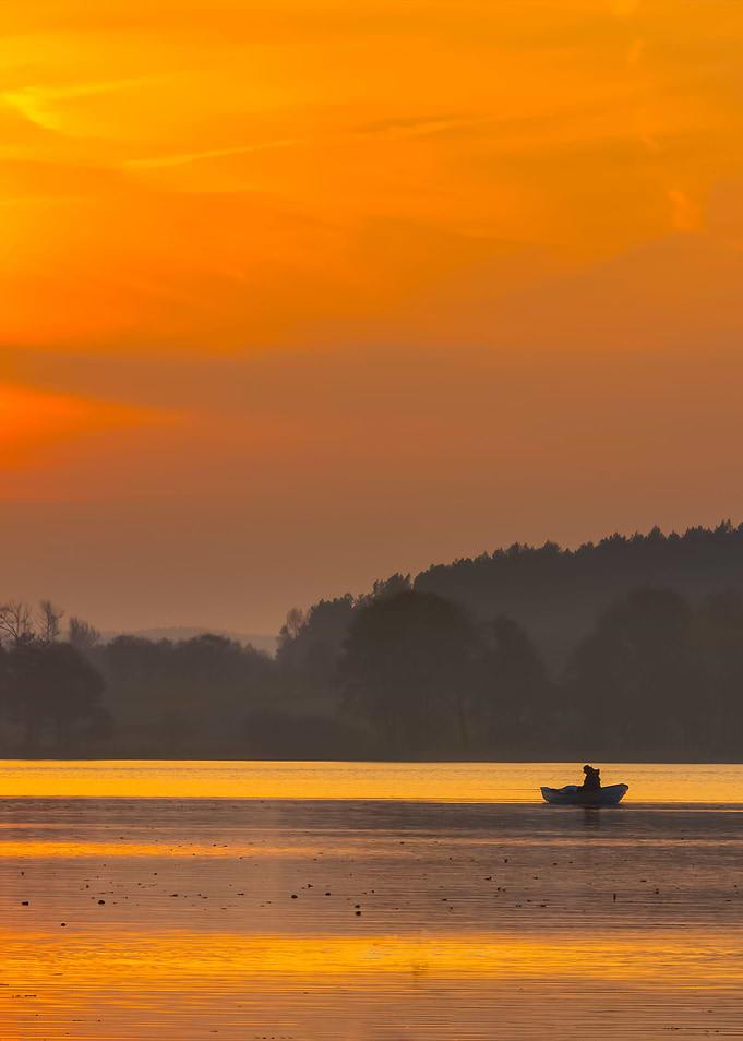 Sunset Lake With Fisherman