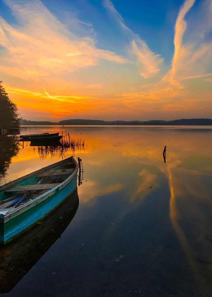 Sunset Lake With Fisherman