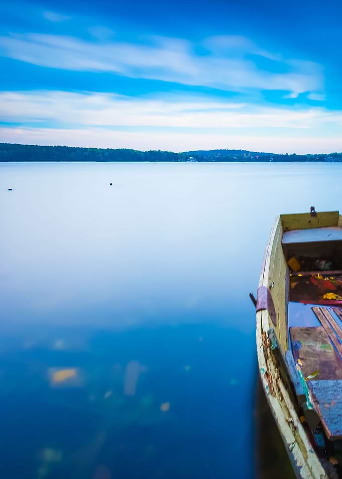 Lake Shore With Moored Boa