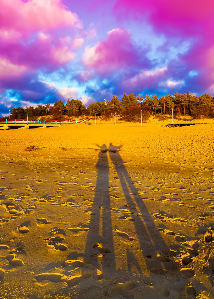 Long Shadows Of Man And Wo