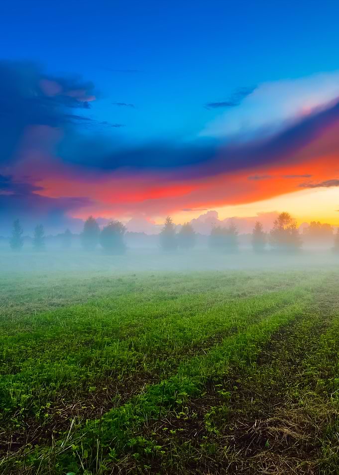 Sunset Over A Mysty Field