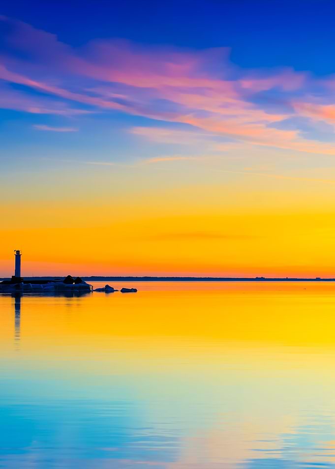 Lighthouse In The Sea At T