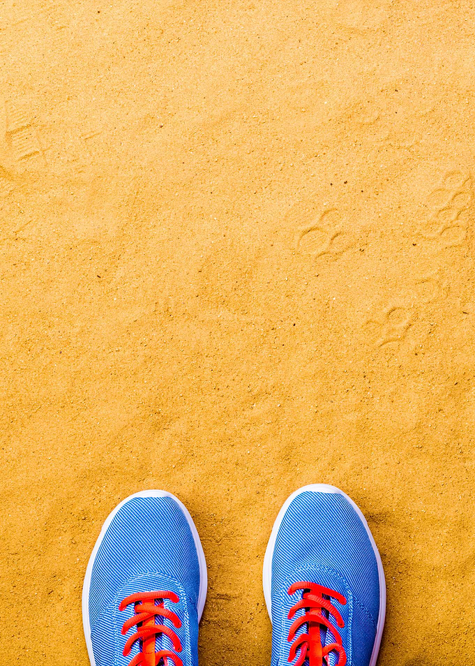 Blue Sports Shoes Laid On