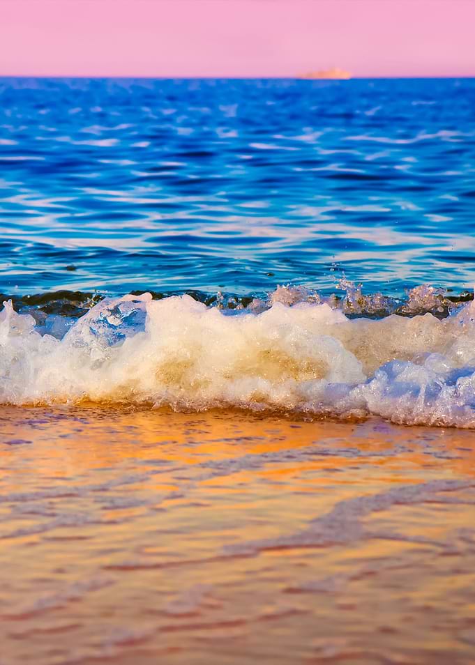 Wave Hitting A Beach At Su