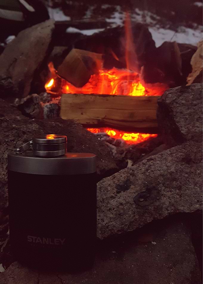 Hip flask by the bonfire